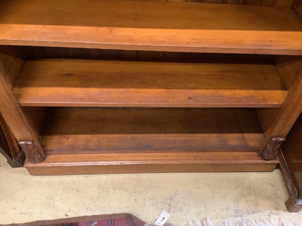 A Victorian faded mahogany open bookcase, width 112cm, depth 34cm, height 121cm